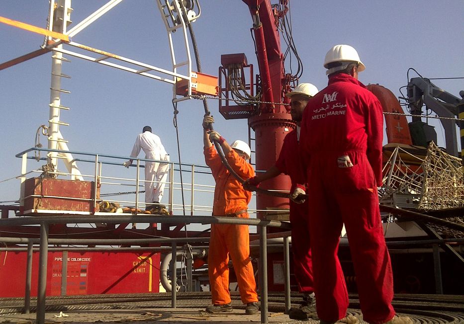 Crew working cable at the stern